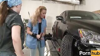 A tiny ginger teen gets her pussy eaten by a busty lesbian in the garage