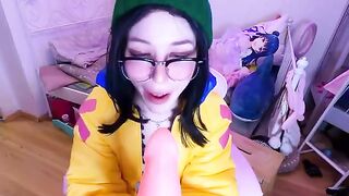 A cute cosplay girl plays a popular game and fucks a big toy