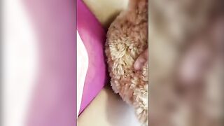 A girl is horny and humping a teddy bear passionately