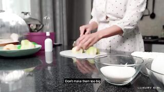 Luxury Girl prepares American Pie in the kitchen, showcasing her stunning 36D curves and captivating blue eyes as she delivers an intimate, unfiltered experience in this steamy homemade video