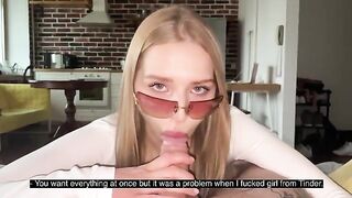A beautiful whore wearing glasses gets a cumshot right on her face