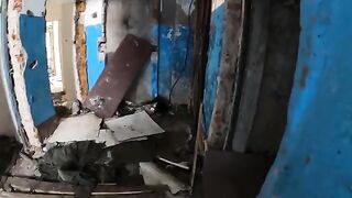 An exhibitionist girl walks through abandoned buildings with her hot GF