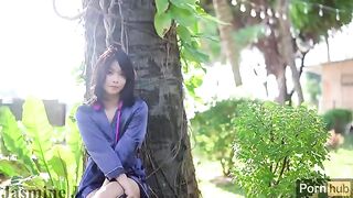 A beautiful Asian girl has sex in the garden