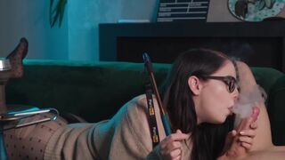 Girl in glasses smokes and sucks dick while getting fucked in 69
