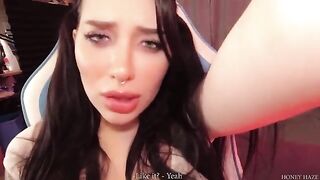 A beautiful woman was playing video games with her boyfriend