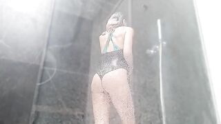 Finger-fucking in the shower ends with a squirting orgasm