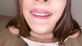 A sexy girl talks dirty on the phone to make her boyfriend cum