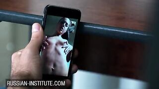 A cute girl warms up her boyfriend with a video call and a favorite toy