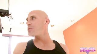 A personal trainer is working with his client in the gym, showcasing some intense action