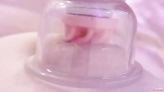 A girl plays with her nipples and pussy using a toy, reaching intense climax