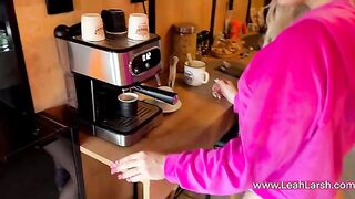 A hot blondie, Leah Meow, serves coffee and offers a special treat