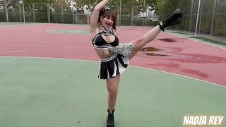 A cheerleader has sex on the street and swallows all the cum