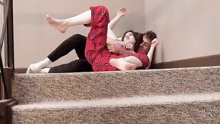 A hot stepsister is teasing her brother, leading to a steamy encounter on the stairs