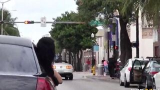The guy has fun with two girls in the car
