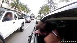 The guy has fun with two girls in the car