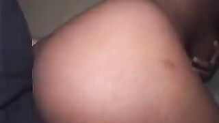 A cute girl is fucking hard with a negro in ass