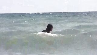 Two girls are not ashamed to sunbathe naked on the beach