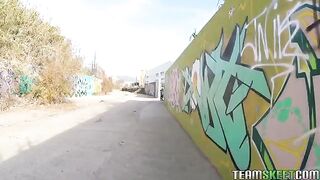 A man has sex with a girl in public place, passing by