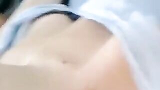 A half-naked lie and body stroking with her hands