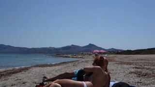 Public blowjob action on the beautiful beach