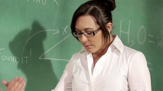 The girl is having fun with her teacher at the table