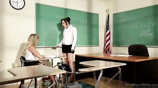 The girl is having fun with her teacher at the table