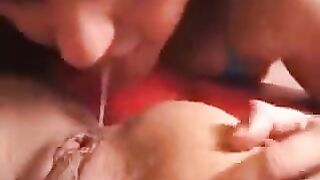 Two charming girls in ass-licking action on 91porn