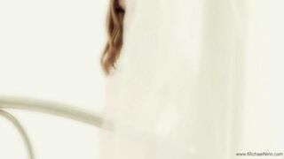 A young and beautiful girl is indulging in solo pleasure