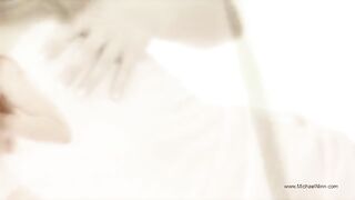 A young and beautiful girl is indulging in solo pleasure