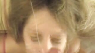 A hot woman does a blowjob and gets a cumshot on her face