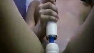 A girl demonstrates how to masturbate, guiding with expert hands in a sensual homemade video