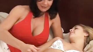 A young girl is having fun with her experienced lesbian girlfriend