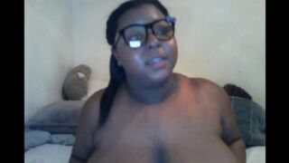 A black woman with big natural tits closed the camera during a milking session