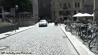 A girl has a walk with her pussy without panties in the city