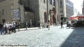 A girl has a walk with her pussy without panties in the city