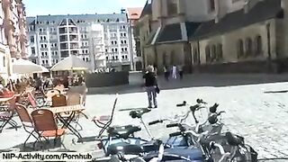 A girl has a walk with her pussy without panties in the city