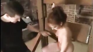 Redhead beauty tied up and fucked in BDSM style