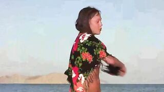 A member shows a naked girl in a public place