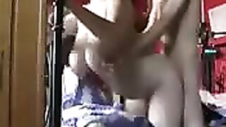 A busty woman fucks in her ass at home with a strong man