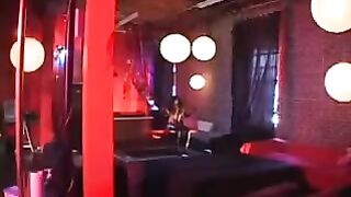 Black latex doll riding cock, showcasing intense passion