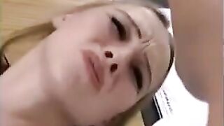 Fragile blonde girl fucks in her pussy with a whole fist
