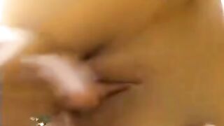 The girl sucks and licks the testicles of her boyfriend outdoors