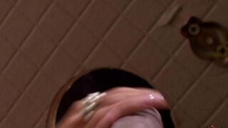 A blowjob in the toilet hole from a stunning beauty