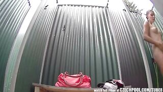 A girl took a shower and suddenly a camera appeared