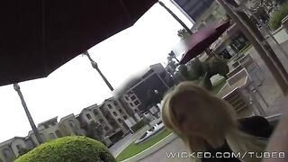 A sexy blonde girl got into the car and started to throw herself on the guy