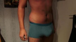 A man unbuttoned his pants and released his sperm in them