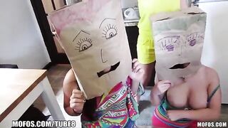 The girls wear on their heads shopping bags and have sex with guys