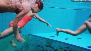 Nude beauties in the pool, captured by a sneaky camera