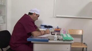 The doctor used a device to stretch the girl's pussy