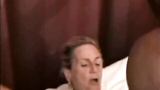 A sexy black guy fucks a mature woman with big tits